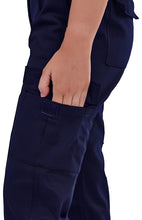 Navy blue pants with a hand in the pocket on a white background